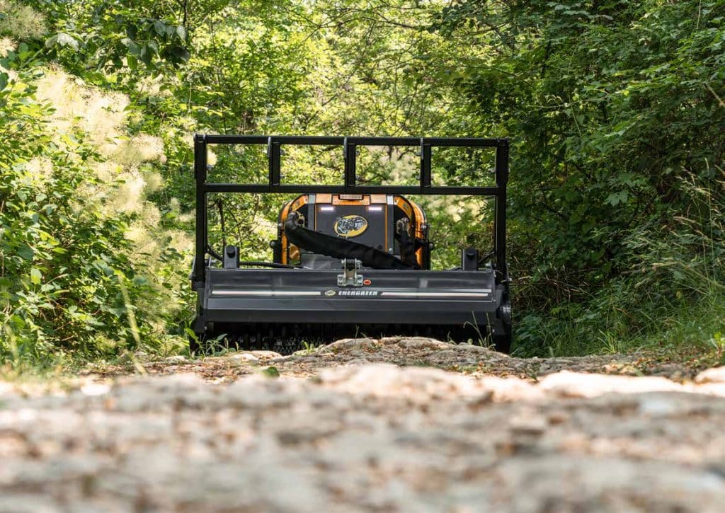 Energreen RoboPlus tracked robot fitted with forestry mulcher head for heavy vegetation