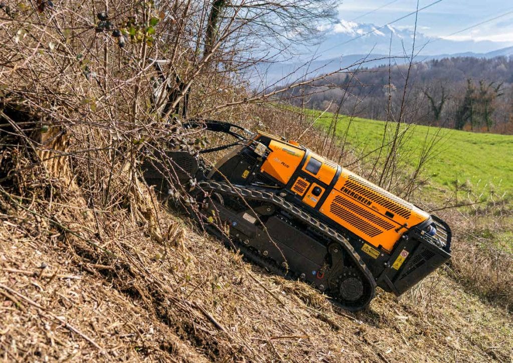 Energreen RoboPlus operating on a steep hillside demonstrating 61 degree slope capability